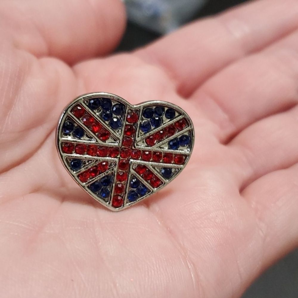 Silver tone British themed ring size 8 approx